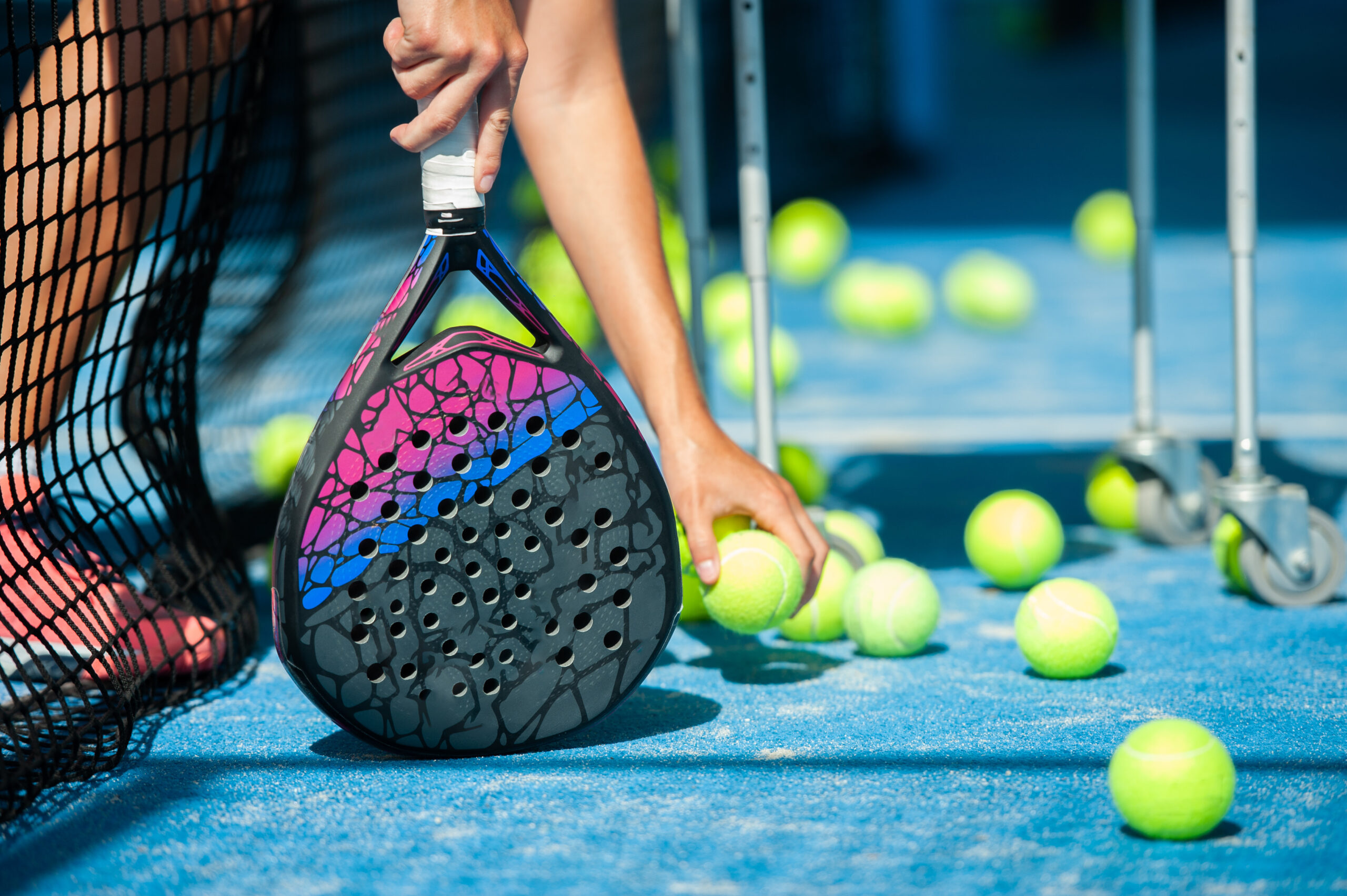 close-up of balls and paddle racket